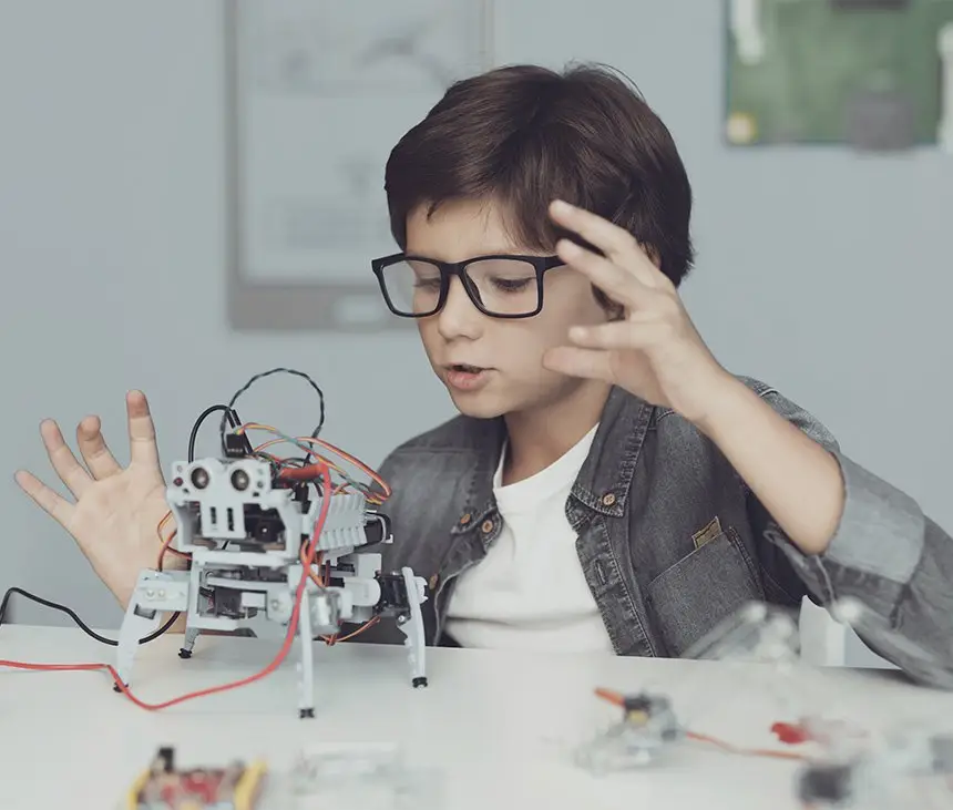 Boy with robot during IQ test for gifted child
