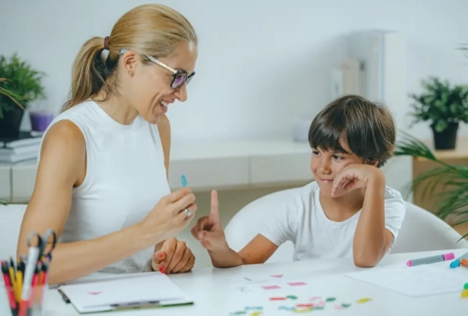 Child and teacher during mental health assessment