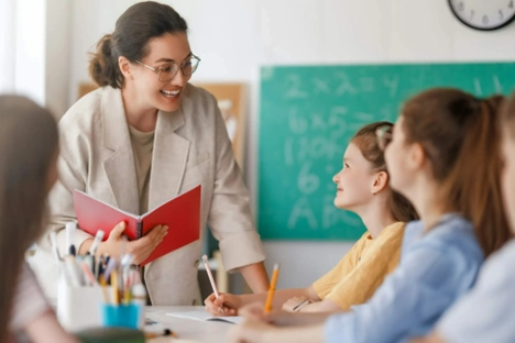 Teacher explaining psycho-educational assessment near me.